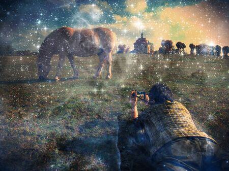 Photographer with Icelandic Horse that wanted grazzing close.   Abstract filter.