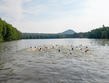 Start of swimming for the triathletes in an amateur triathlon competition in Radvanec. SAMUEL XC triathlon Radvanec, Czech Republic.   23th of August 2019のeditorial素材