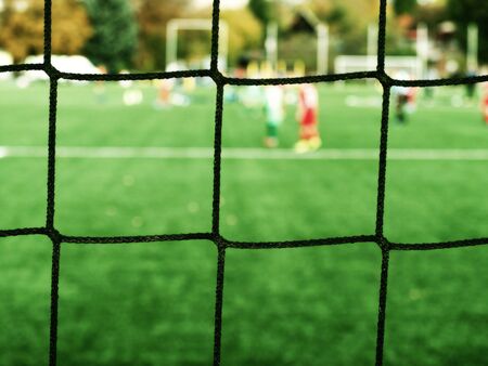 Goalie Guards Soccer Football Goal. Goalkeeper catching a balの写真素材