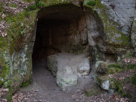 End of cave enter to underground caves and catacomb. The journey underground through sandstone tunnelsの写真素材