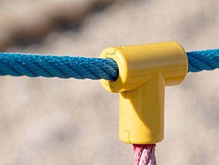 Covered jointed point of ropes with plastic cover  in children spider web, use a symbol for...