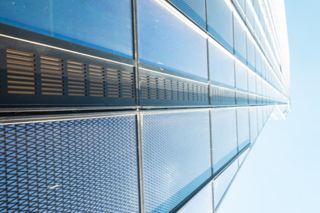 Vienna, Austria, 8th of May 2016. Structured facade made of glass and steel. Dominant of the...