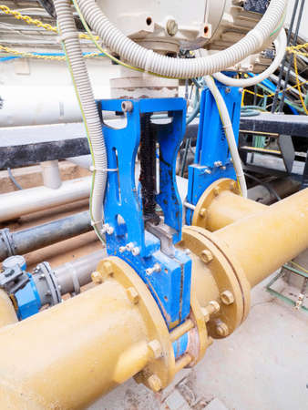 Company underground shaft. Screwed pipelines from bended steel pipes, a system for pumping liquids or gas for the industry.の写真素材