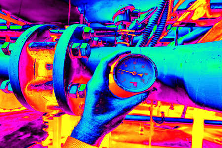 Flanges and bolts on the water pipe line of an industrial plant in the covered area. Gamma radiation spectrum in simulator.の写真素材