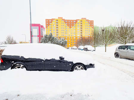 Cars under the snow. Concept: not the weather in the city. Town suburbの写真素材