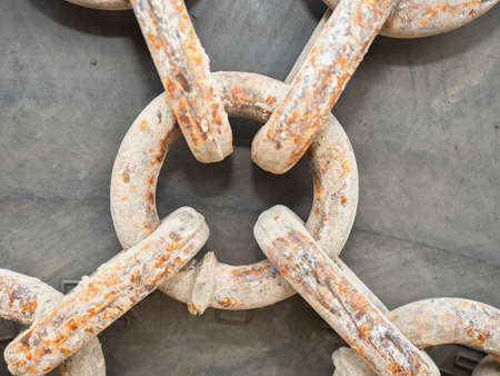 Mine loader tire with protective chain. Wheel chain link detail, cover on wheels.の写真素材