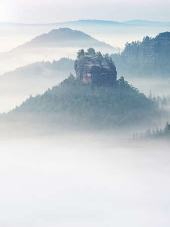 The fabulous Winterstein, also called Hinteres Raubschloss or Raubstein. It is a sandstone rock massif, the butte in the Saxon Switzerland National Park in the Bad Schandau region, Germanyの写真素材