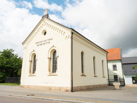 Hermanuv Mestec, Czechia. 26th of August 2021. Repaired synagogue in Hermanuv Mestec town, Czech Republic. Temple of God dated from the seventeenth century. Cloudy sky in backgroundのeditorial素材