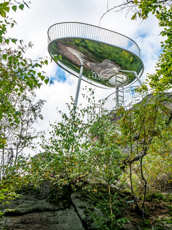Interesting lookout tower Spicka, a viewing platform in the design of a spaceship. View of the mountain peak Maly Spicak, at Tanvald town, Czechiaの写真素材