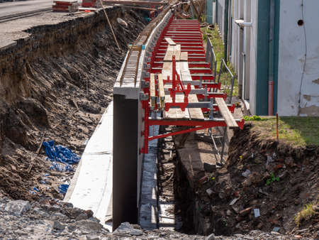 Modular formwork panel system for casting reinforced concrete into the support wall under the main roadの写真素材