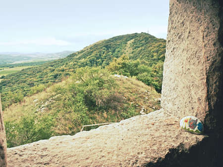 Devicky castle ruin, Czechia. 29th of August 2021. The picture painted on a stone is part of a children's tourist game. Devicky ruin window, Pavlov region. South Moravia, Czechiaの写真素材