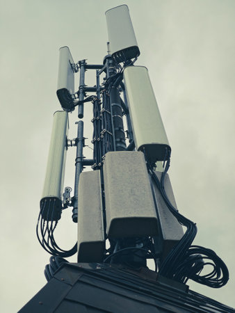 Vertical shot of the satellite tower on a foggy day.の写真素材