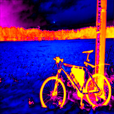 Mountain bike in snow, winter landscape Thermal camera photography, infrared scanの写真素材