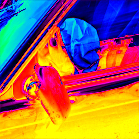 Collapsed airbag in the crashed car. Thermal camera photography, infrared scanの写真素材