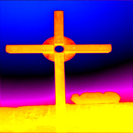 Old wooden cross at hill peak. Thermal camera photography, infrared scanの写真素材