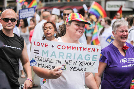 MANHATTAN, NY - June 26, 2011: Colorful balloons and rainbow flags at the 2011 Gay Pride Parade on...