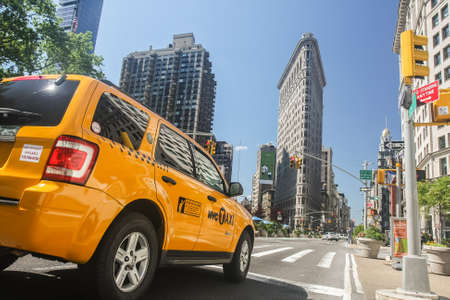 MANHATTAN, NY - November 7, 2011: Yellow cabs in the streets of Manhattan near the new york times...