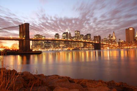 MANHATTAN, NY- May 9, 2009: The famous Brooklyn Bridge in New York City at dawn.のeditorial素材