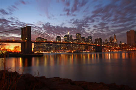 MANHATTAN, NY- May 9, 2009: The famous Brooklyn Bridge in New York City at dawn.のeditorial素材