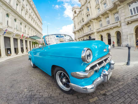 HAVANA, CUBA - January 3, 2015: Old American car parked on the street in Havana.