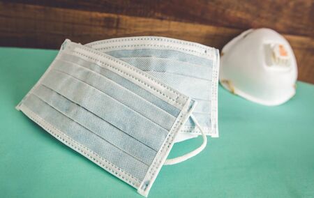 Corona virus prevention face mask protection N95 masks and medical surgical masks at home .