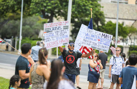 HONOLULU HAWAII: May 1st, 2020: ReOpen Hawaii Rally, Protests to reopen businesses during Coronavirus COVID-19 shutdowns at the Hawaii State Capitol.のeditorial素材