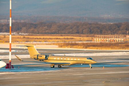 Vladivostok, RUSSIA - Jan 10, 2020: N700MK of the Gulfstream G650ER airline standing in the airport...