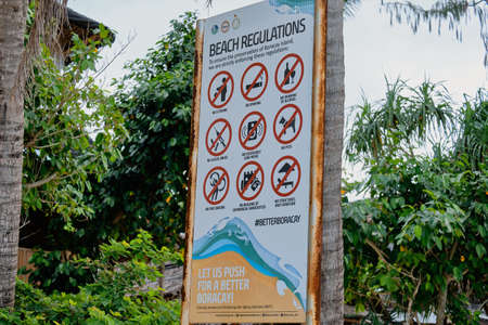 Boracay, Philippines - Jan 2, 2020: Poster with prohibitions on the beach of Boracay island