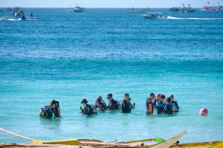 Boracay, Philippines - Jan 23, 2020: Korean tourists are going for diving