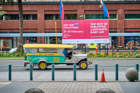 Manila, Philippines - Feb 02, 2020: Jeepneys on the roads of Manila. Former American military jeeps converted to public transportのeditorial素材