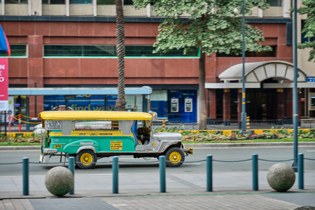 Manila, Philippines - Feb 02, 2020: Jeepneys on the roads of Manila. Former American military jeeps converted to public transportのeditorial素材