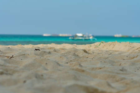 Boracay, Philippines - Jan 30, 2020: Empty White beach of Boracay island in the daytime. No Chinese tourists because of the coronavirus. Boats in the sea carry tourists.のeditorial素材