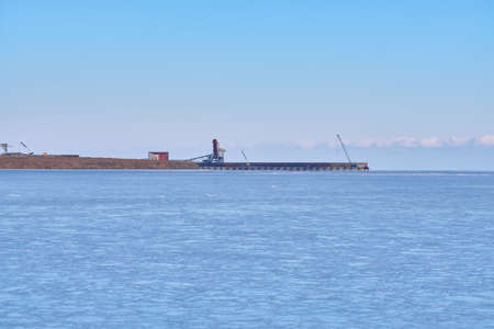 Vanino, Russia - Jan 18, 2021: Vanino Bay in the Tatar Strait in winter. The frozen seaのeditorial素材