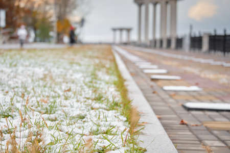 The first snow in Khabarovsk, Russia. Embankment in the snow.の写真素材