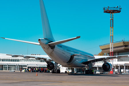 KHABAROVSK, RUSSIA - SEP 29, 2018: People at the airport are standing in line to Board the plane.