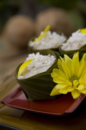 Thai food delicacies presented in traditional settingsの写真素材