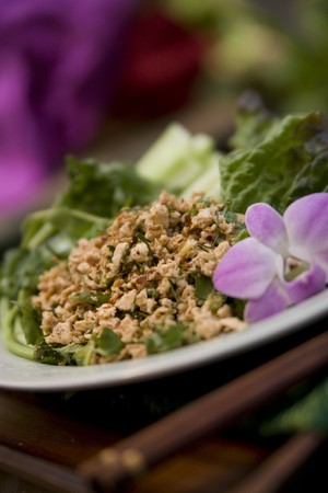 Thai food delicacies presented in traditional settingsの写真素材