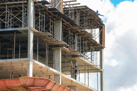 Civil construction of a building with part of the structure ready and the upper part still under...