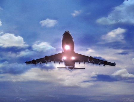 a airplane flying in the sky, provide a travel and airline services concept. の写真素材