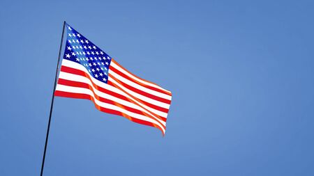 Usa flag in the clear blue skyの写真素材
