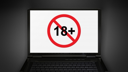 adult sign theme is display on laptop screenの写真素材