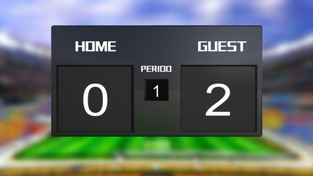 soccer match scoreboard display the goal result with out focus stadium backgroundの写真素材