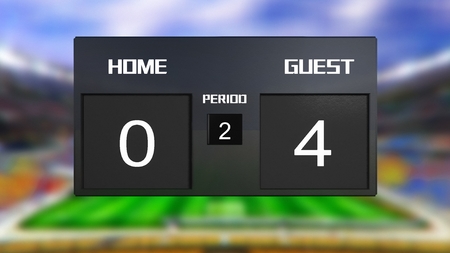 soccer match scoreboard display the goal result with out focus stadium backgroundの写真素材