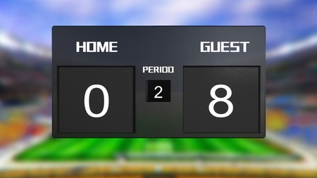 soccer match scoreboard display the goal result with out focus stadium backgroundの写真素材