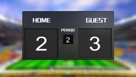 soccer match scoreboard display the goal result with out focus stadium backgroundの写真素材