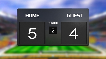 soccer match scoreboard display the goal result with out focus stadium backgroundの写真素材