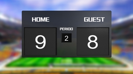 soccer match scoreboard display the goal result with out focus stadium backgroundの写真素材