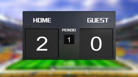 soccer match scoreboard display the goal result with out focus stadium backgroundの写真素材