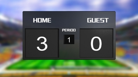 soccer match scoreboard display the goal result with out focus stadium backgroundの写真素材
