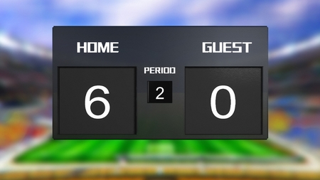 soccer match scoreboard display the goal result with out focus stadium backgroundの写真素材